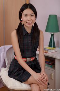 Asian Teen Smiling In Her School Uniform