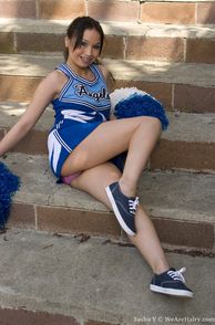 Sweet Asian Teen In Her Cheer Uniform