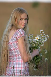 Adorable Eighteen Year Old Blonde With Flowers